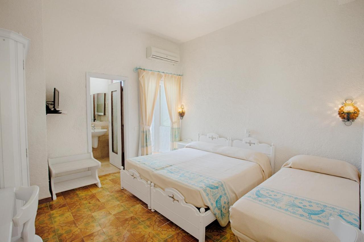 Hotel Al Faro Сан Теодоро Екстериор снимка